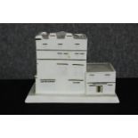 A Coalport limited edition porcelain miniature building of the Savile Row headquarters of Gieves &