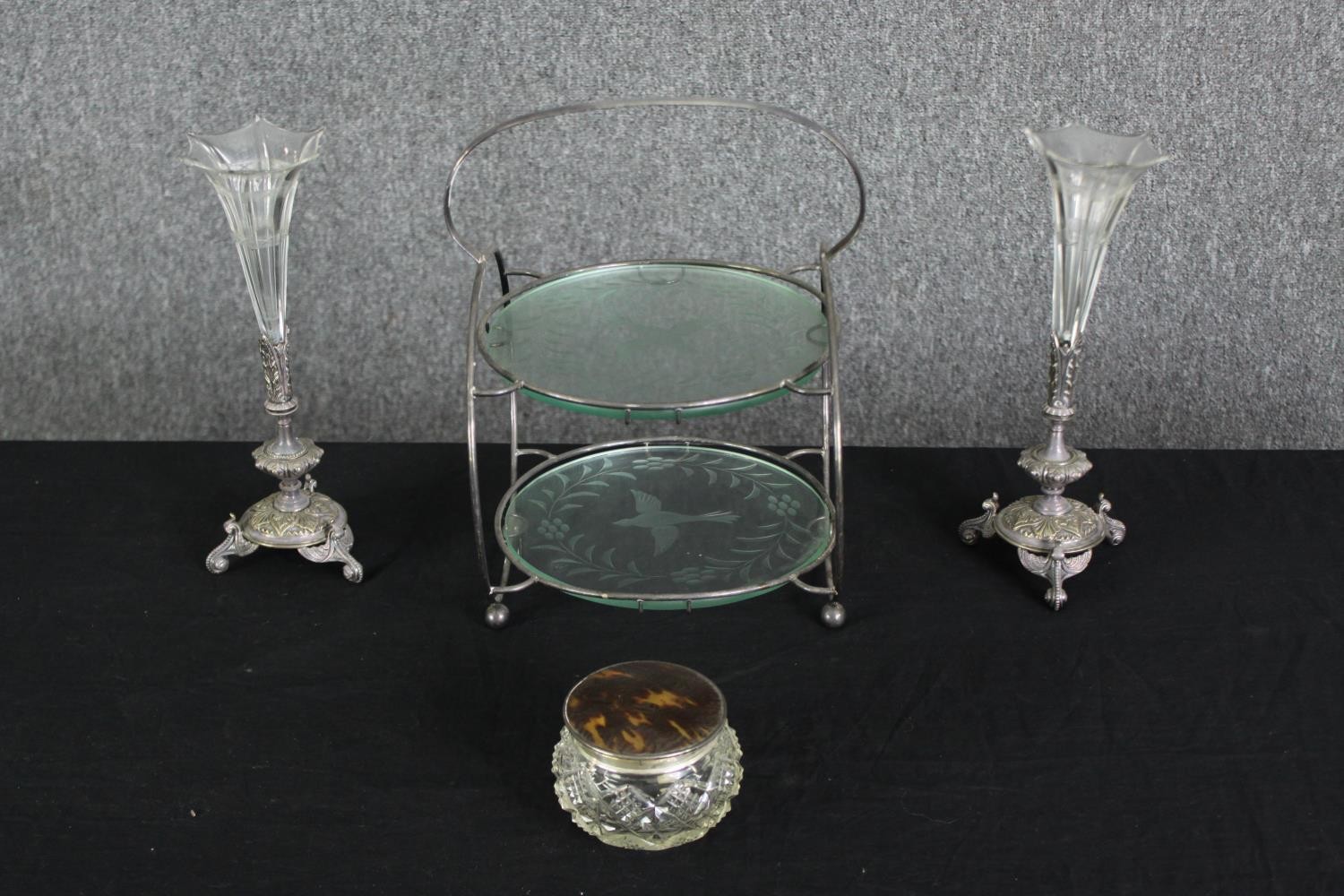 A glass cake stand, a pair of glass and silver plated vases, and a cut glass bowl with tortoiseshell