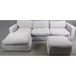A contemporary Plumbs light grey corner sofa and matching stool. H.78 W.290 D.175cm.