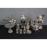 A group of various silver plated wares, including coffee and tea pots, a tea urn, a kettle and cut