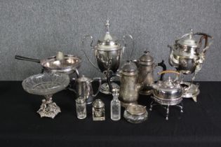 A group of various silver plated wares, including coffee and tea pots, a tea urn, a kettle and cut