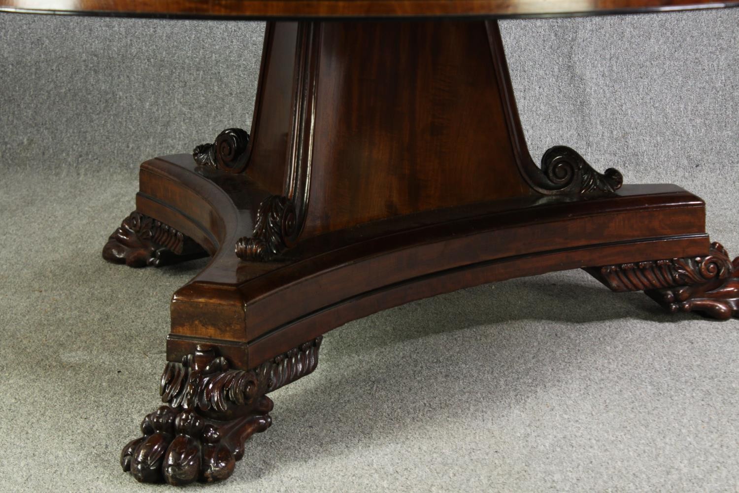 A late Regency style mahogany drum top dining or centre table, bearing a Waring & Gillows - Image 7 of 16