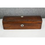 A 19th century rosewood glove or pen box. H.7.5 W.24 D.9cm.