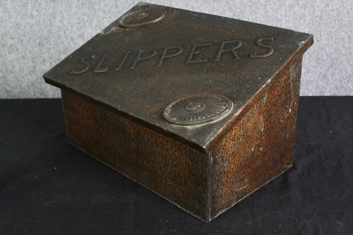 An early 20th century hammered copper slipper box. H.23 W.38 D.21cm. - Image 3 of 5