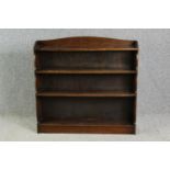 An oak open bookcase, early 20th century. H.96 W.100 D.19cm.