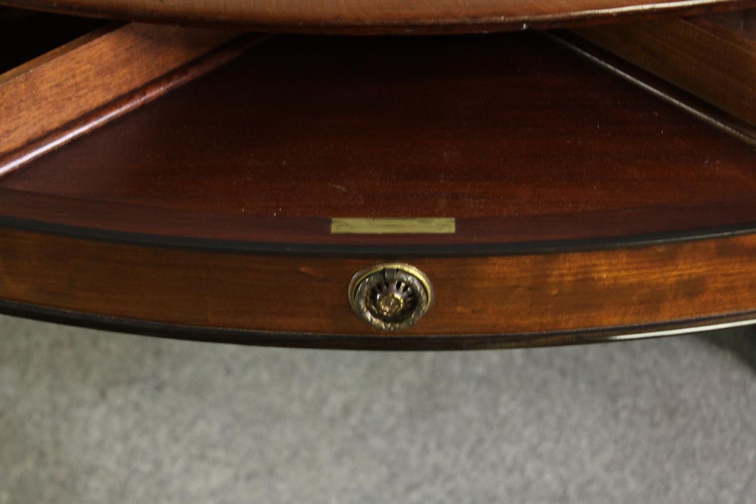 A late Regency style mahogany drum top dining or centre table, bearing a Waring & Gillows - Image 11 of 16