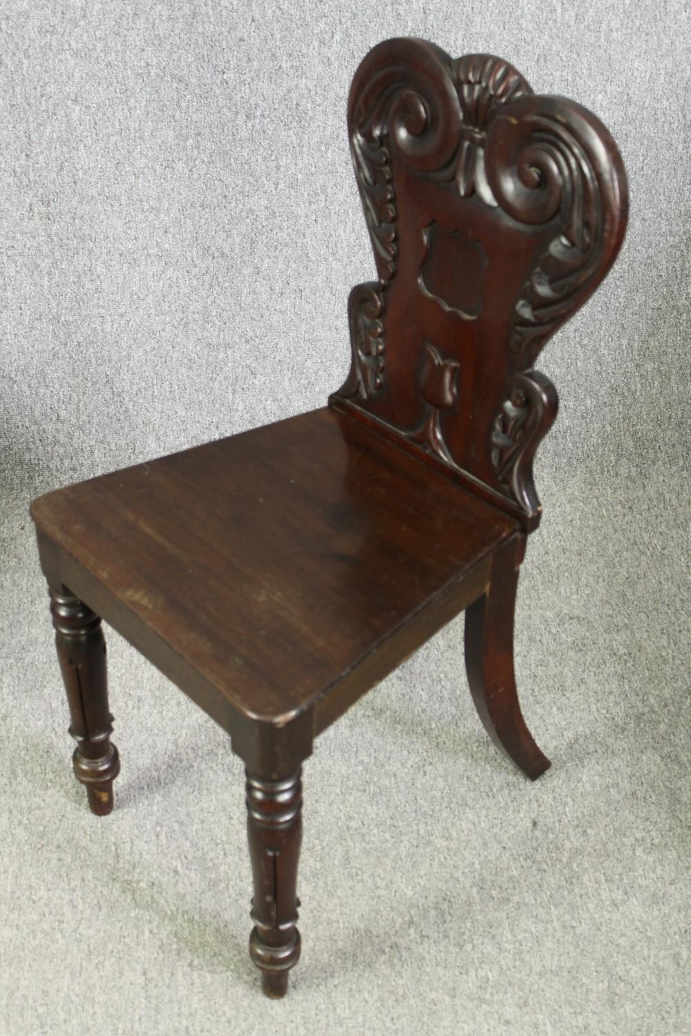 A pair of early Victorian mahogany hall chairs. H.86cm. - Image 4 of 7