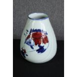 A large 20th century Japanese celadon glaze vase with stylised koi carp and incised scale texture,