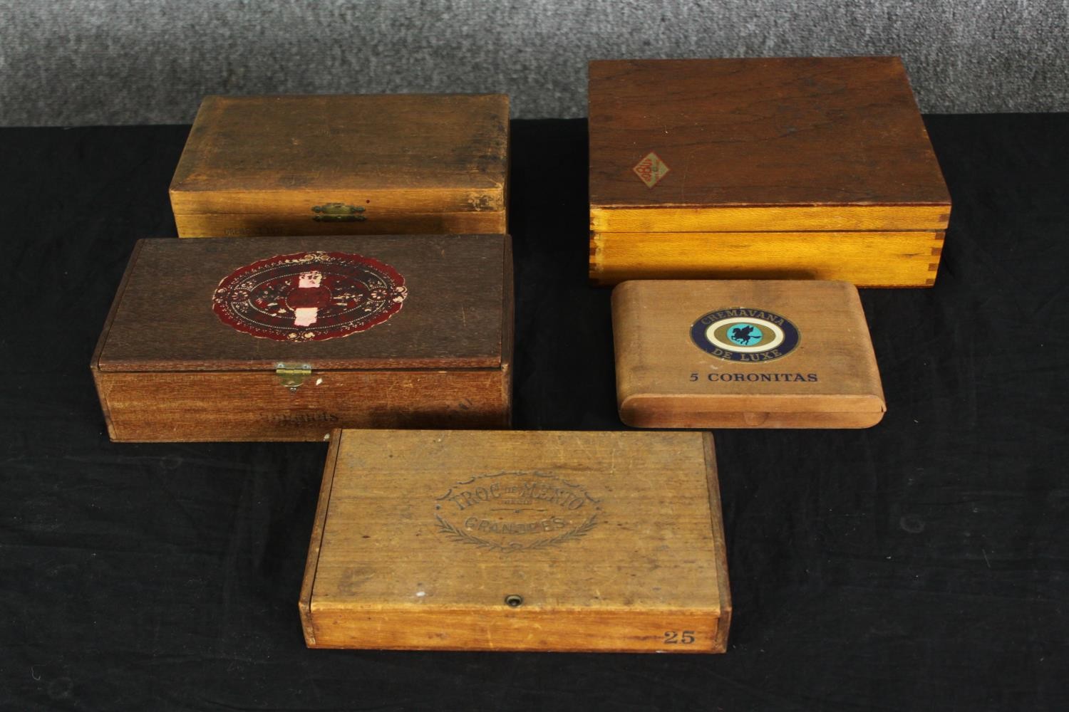 A group of vintage cigar boxes. H.7 W.22.5 D.18.5cm. (largest).