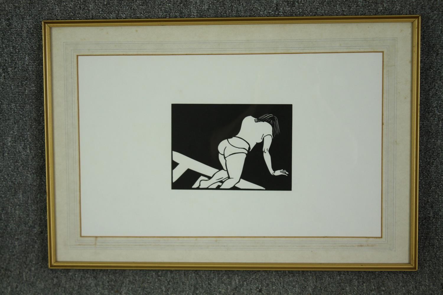 A woodcut print of a woman, in a gilt and glazed frame. H.42 W.63cm. - Image 2 of 3