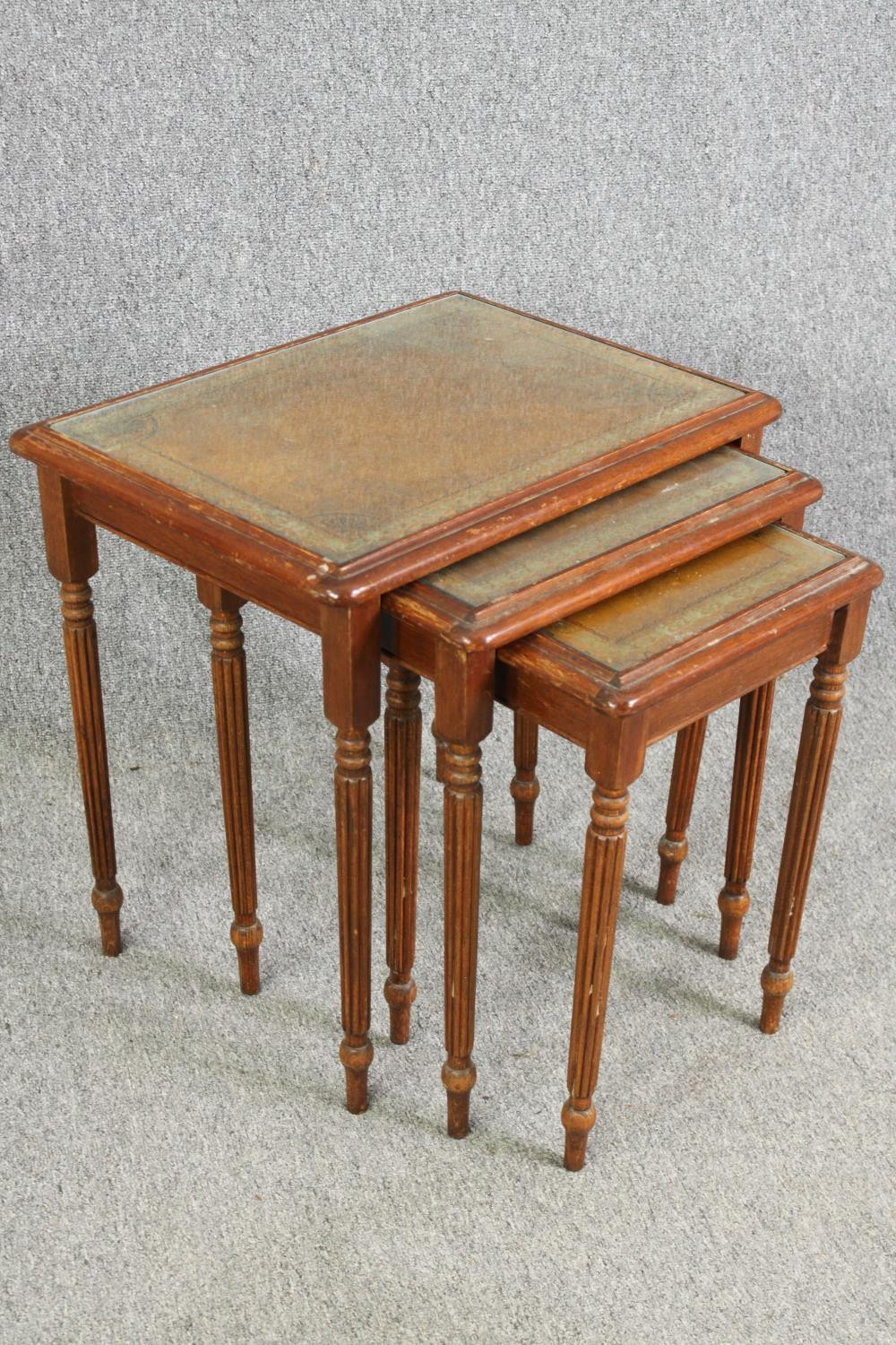 A nest of three mahogany tables with leather and glass inset tops H.58 W.53 D.40cm. (largest). - Image 2 of 6