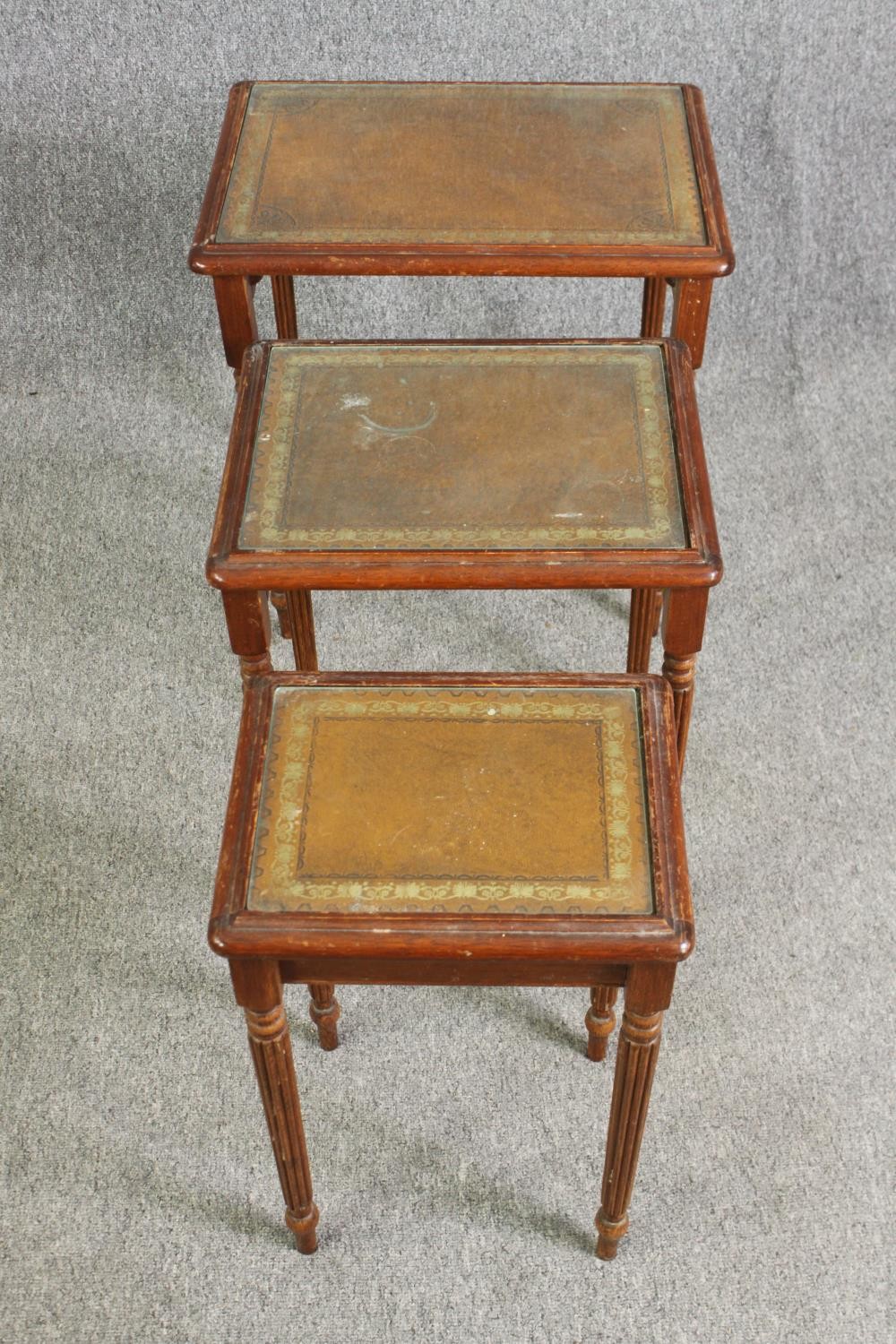 A nest of three mahogany tables with leather and glass inset tops H.58 W.53 D.40cm. (largest). - Image 3 of 6