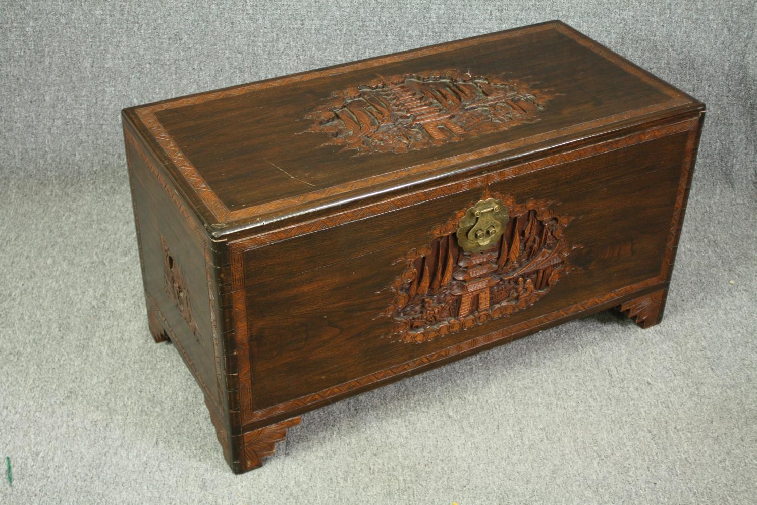 A 1920's Chinese camphorwood chest. H.50 W.93 D.45cm. - Image 2 of 9