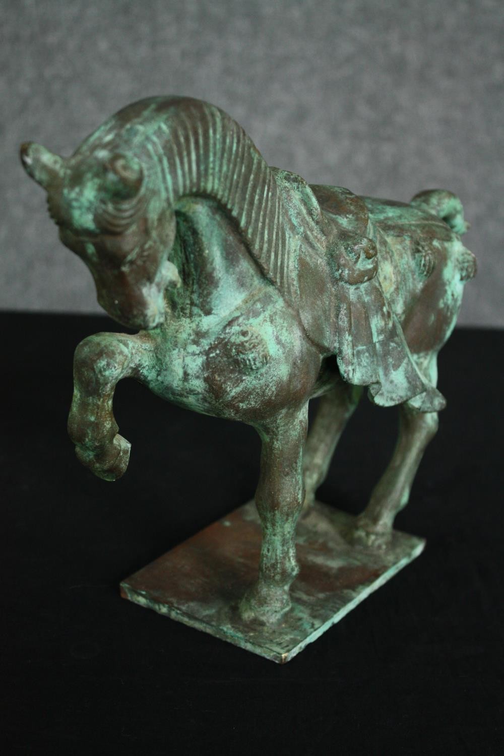 A Chinese Tang style bronzed metal model of a horse, with verdigris patination. H.22cm. - Image 2 of 6