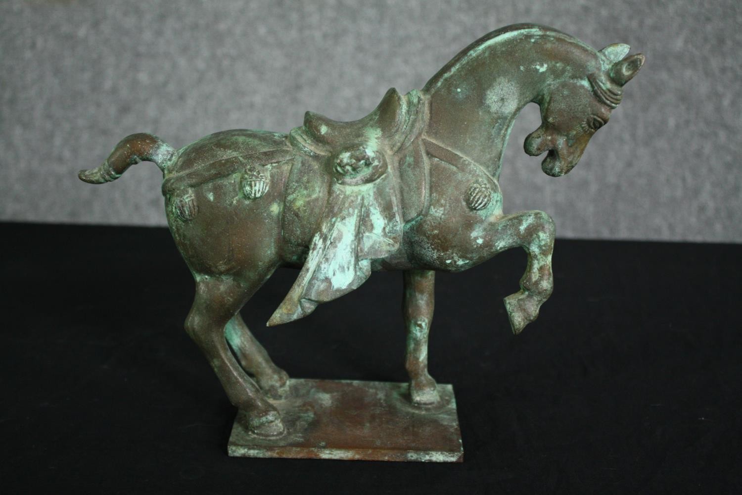 A Chinese Tang style bronzed metal model of a horse, with verdigris patination. H.22cm. - Image 3 of 6