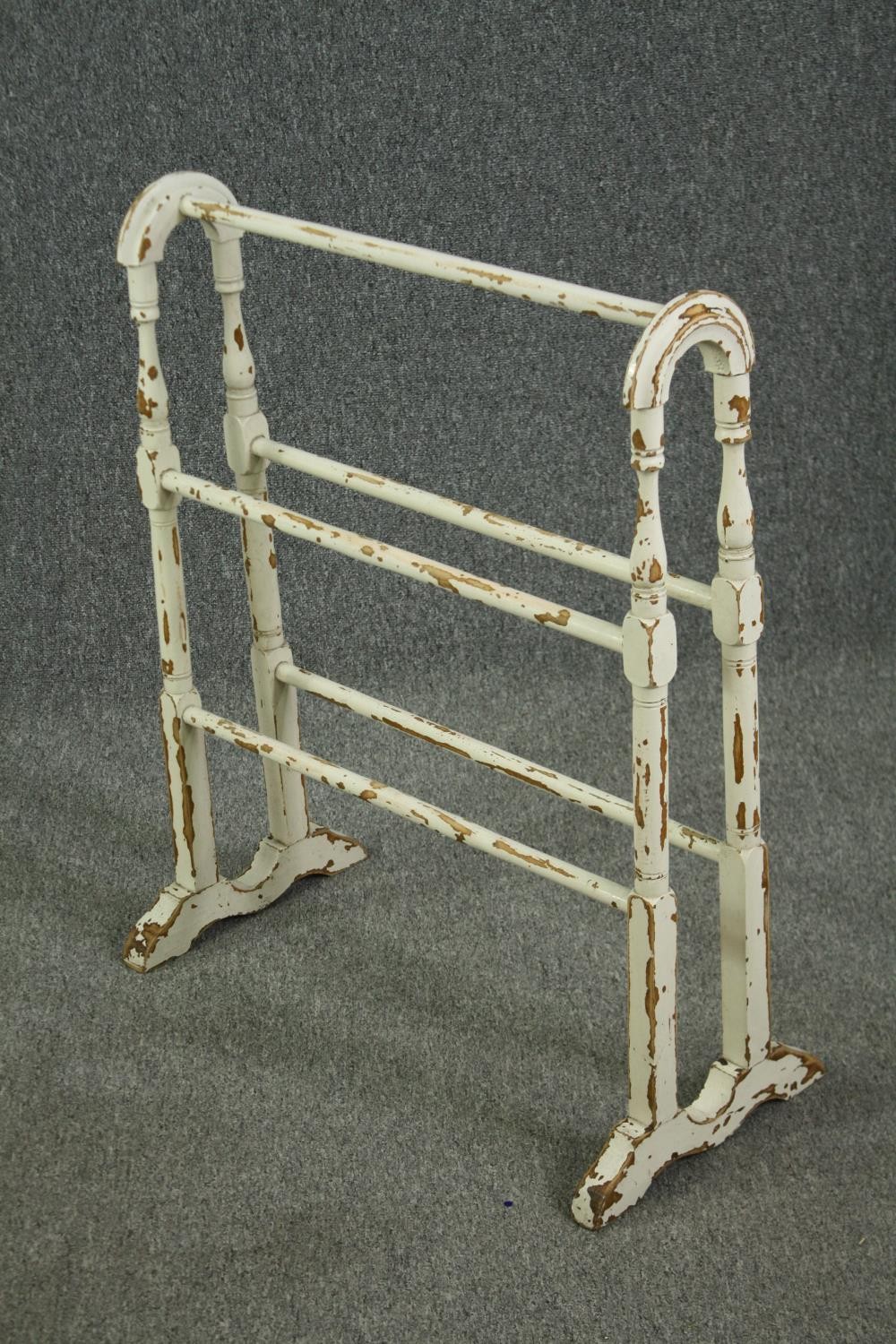 A Victorian distressed white painted towel rail. H.80 W.67 D.16cm. - Image 4 of 5