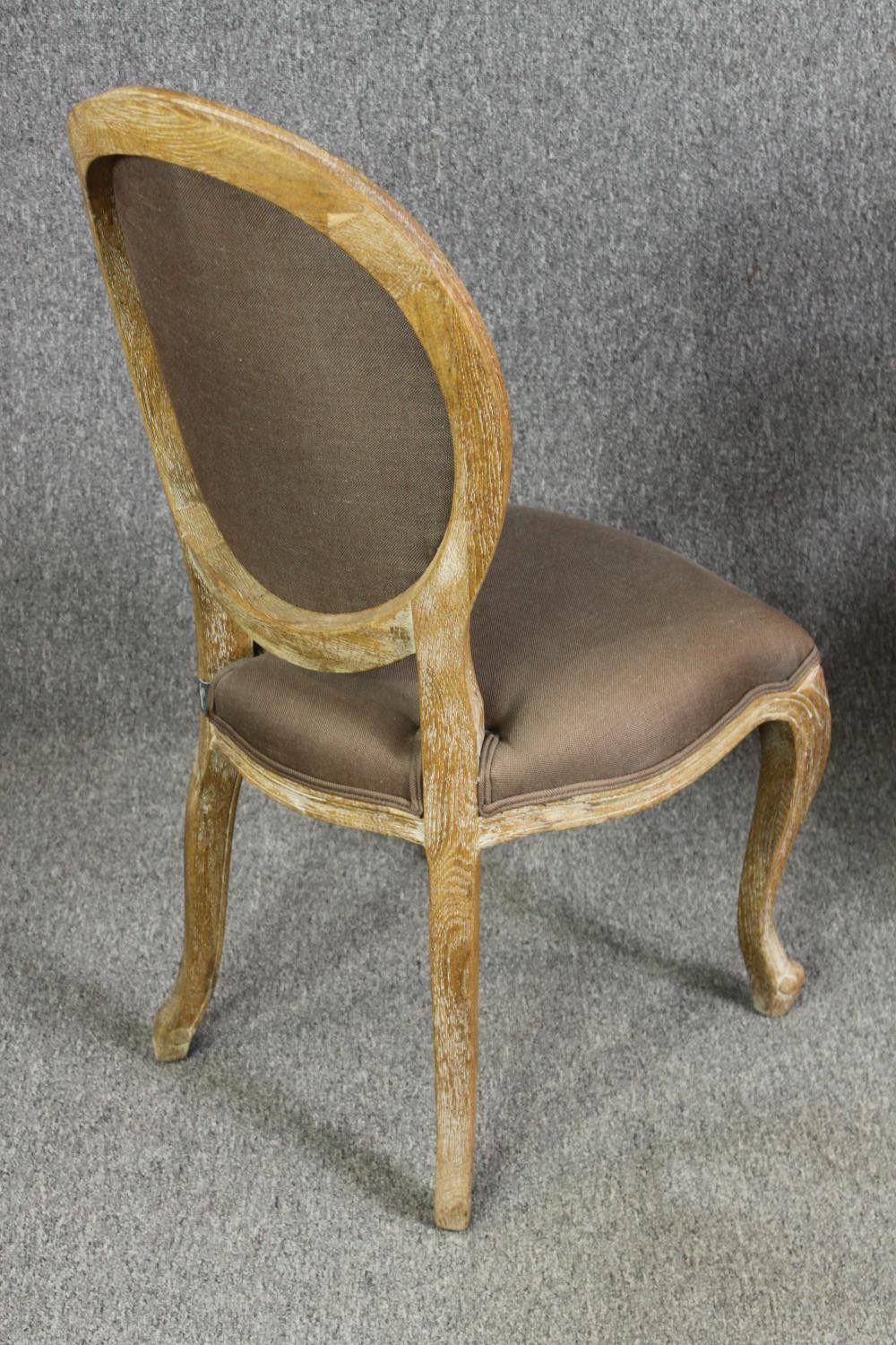 A set of eight Flamant French style limed oak and upholstered dining chairs, including two carvers - Image 4 of 11
