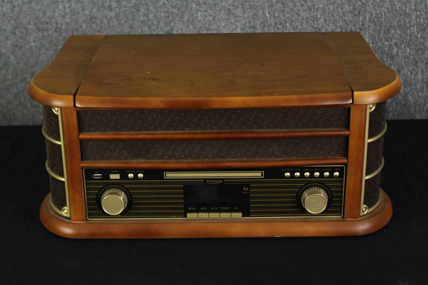 A Zennox model D9985 record and cassette player. H.22 W.49 D.36cm.