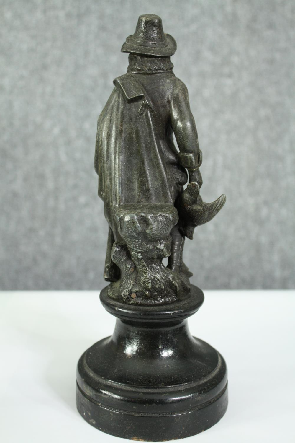 Two 19th century spelter figures of a huntsman and fisherman. H.25cm. (each). - Image 7 of 8