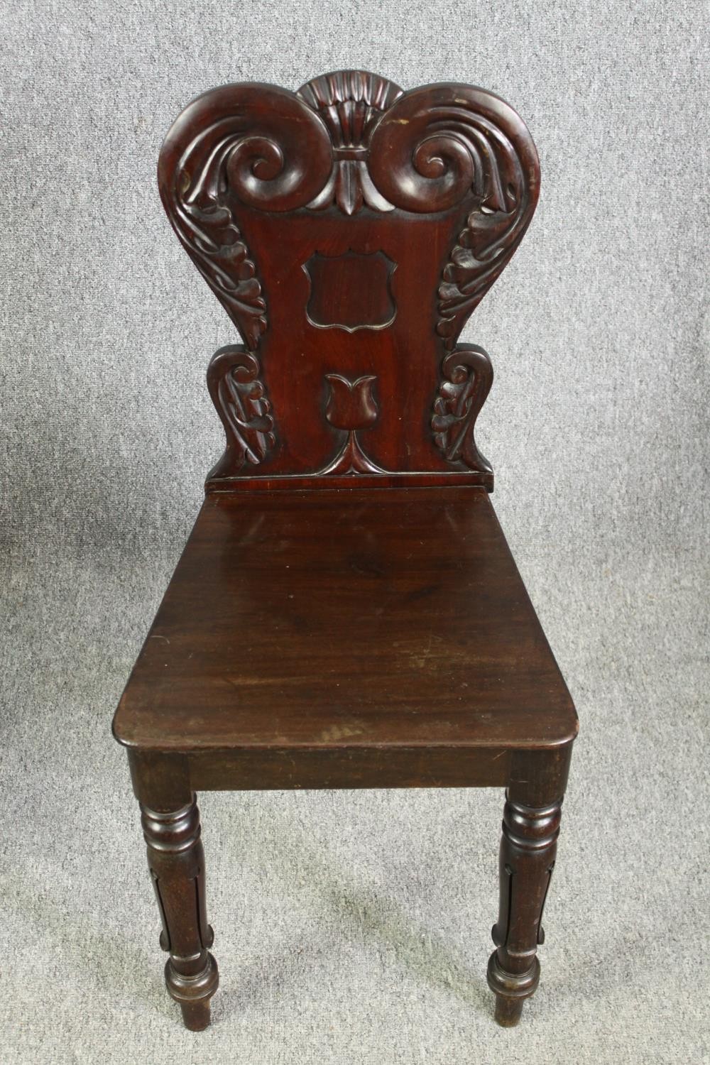 A pair of early Victorian mahogany hall chairs. H.86cm. - Image 2 of 7