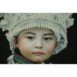 Oil on canvas, portrait of a young Eastern girl in a Hmong Miao headdress, within a hardwood