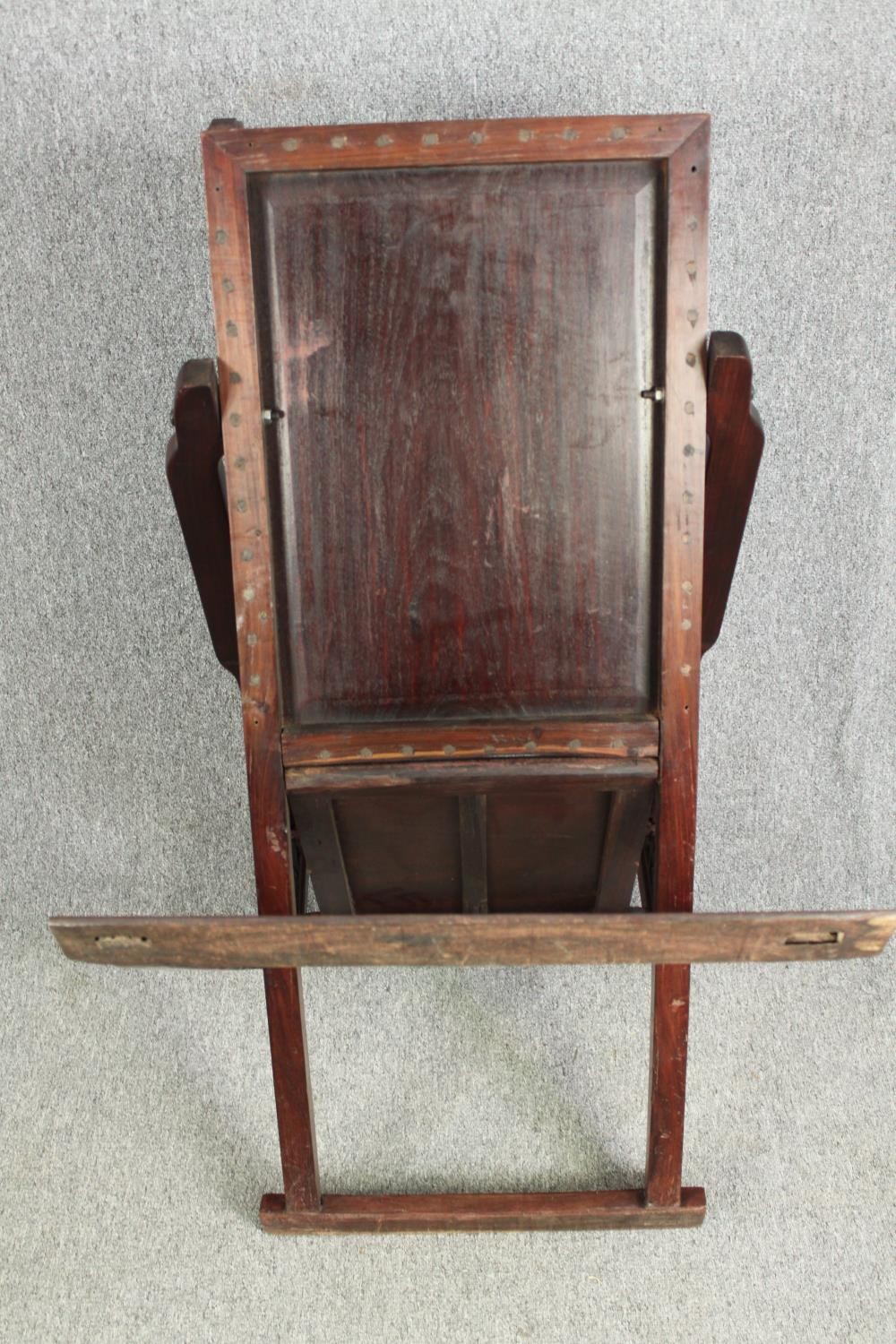 A Chinese carved hardwood folding chair, 19th century. H.78 W.112 D.59cm. - Image 12 of 12