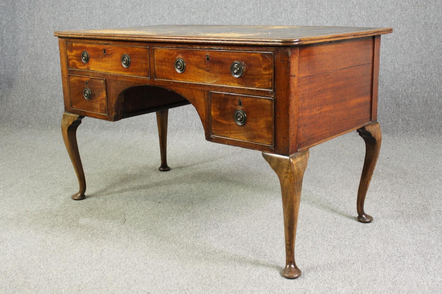 A George II style mahogany writing desk, with a worn leather top. H.76 W.123 D.66cm. - Image 3 of 5