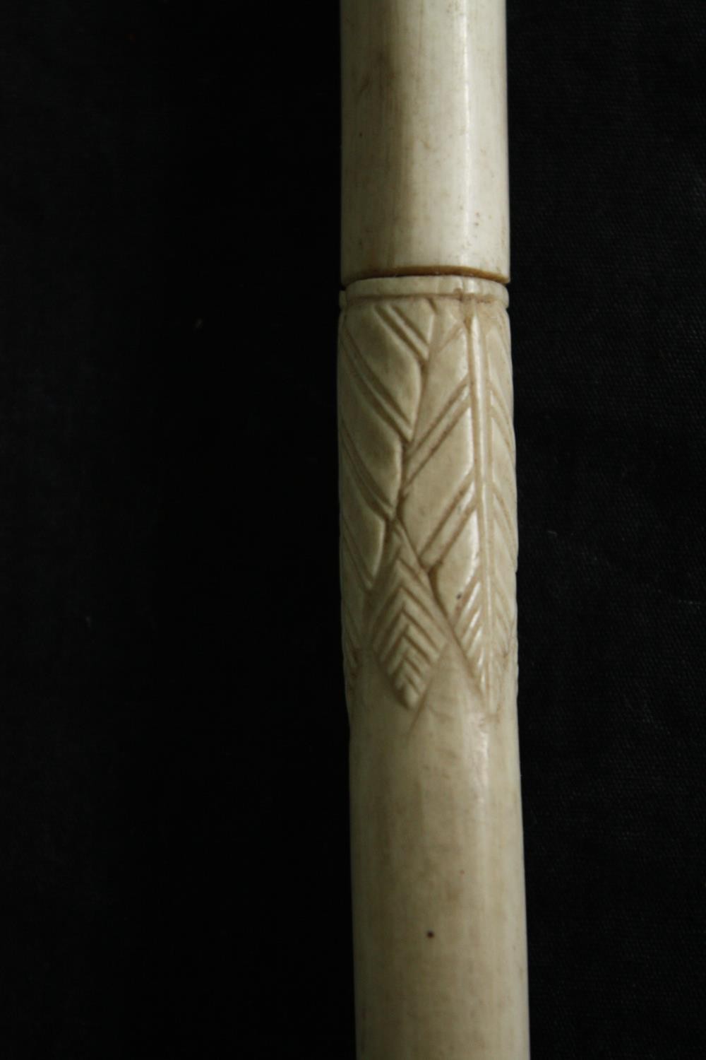 An Indian carved bone walking stick. L.90cm. - Image 6 of 6