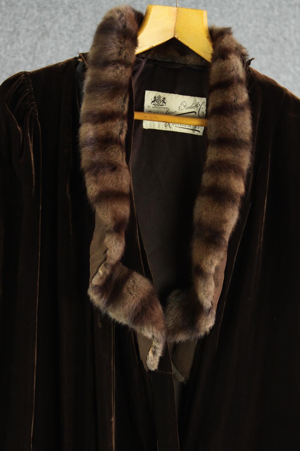 A Debenham and Freebody, London, vintage velvet and fur collared evening coat. Makers label to - Image 8 of 9