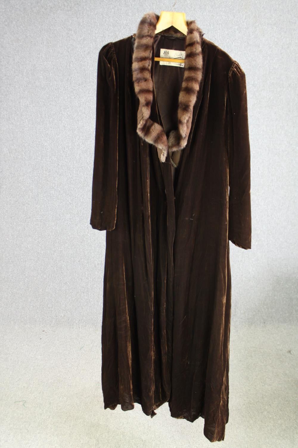 A Debenham and Freebody, London, vintage velvet and fur collared evening coat. Makers label to - Image 7 of 9
