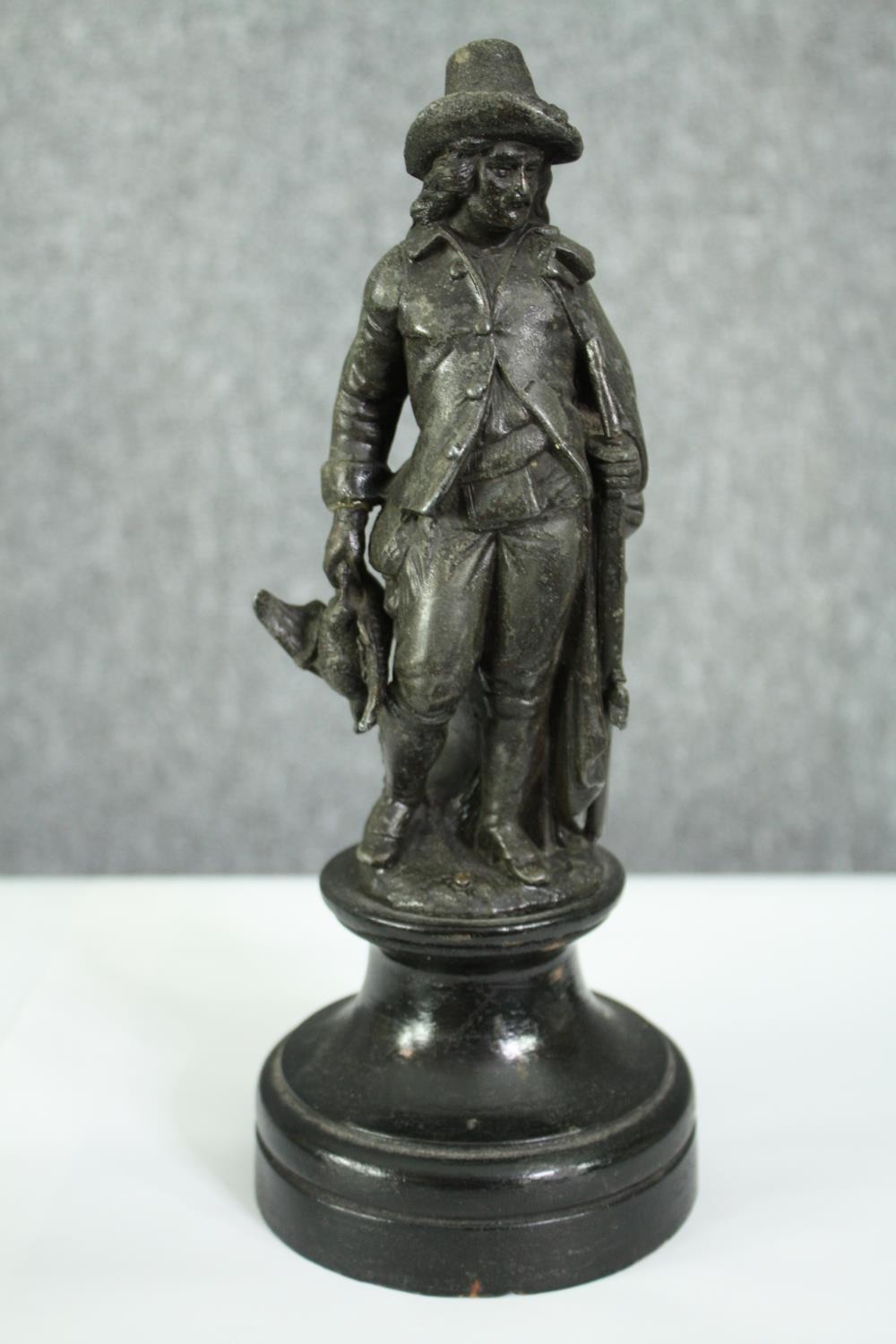 Two 19th century spelter figures of a huntsman and fisherman. H.25cm. (each). - Image 5 of 8