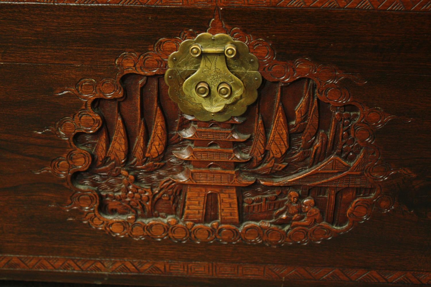 A 1920's Chinese camphorwood chest. H.50 W.93 D.45cm. - Image 6 of 9