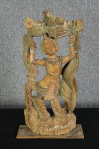 An Indonesian carved hardwood figure of Buddha. H.66 W.36 D.13cm.