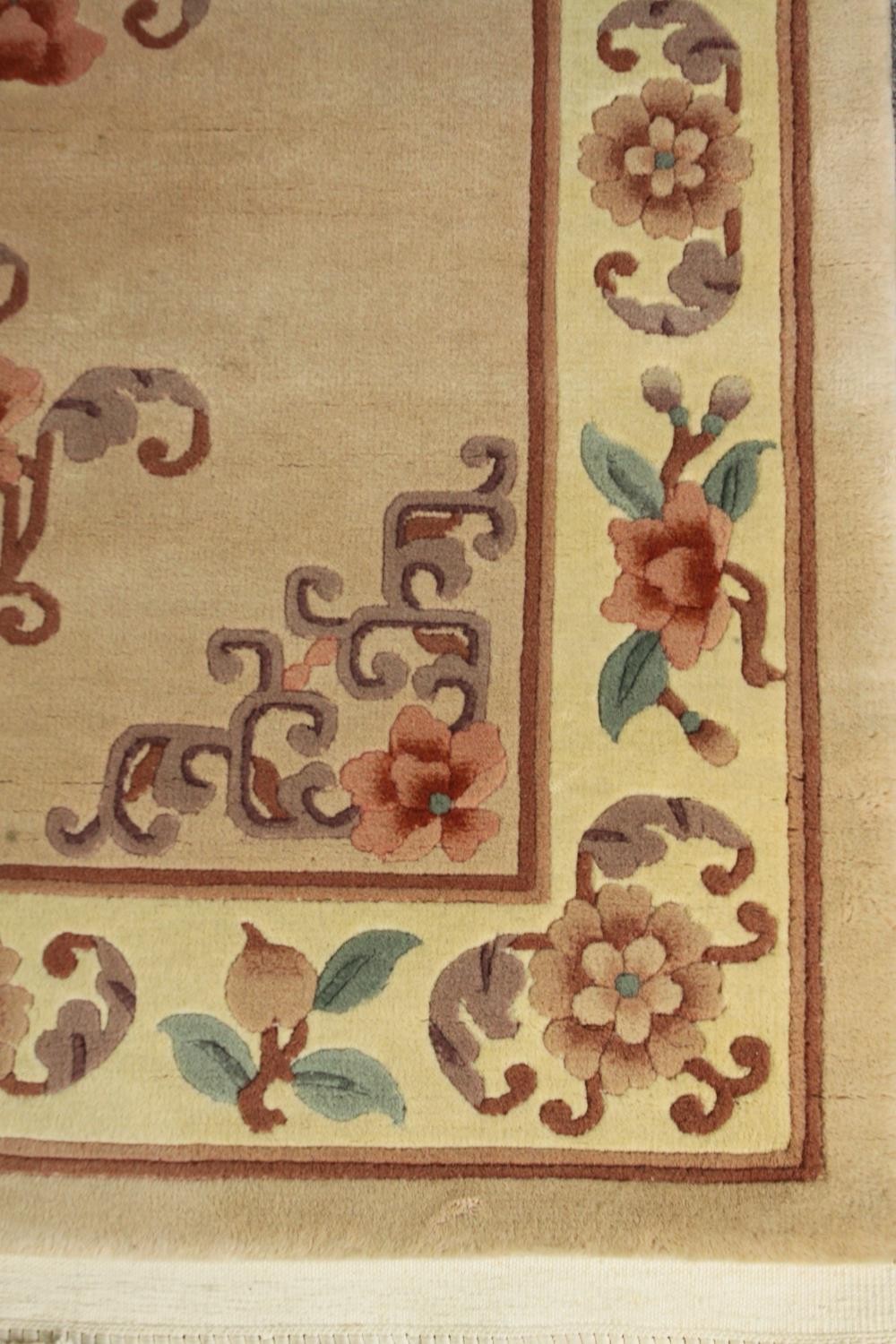 A Chinese style rug, with beige ground. L.163 W.92cm. - Image 3 of 4