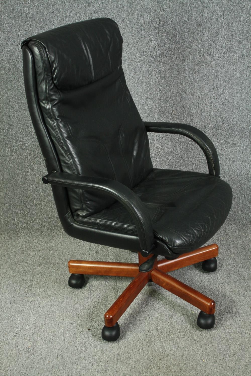 A 1970's style office swivel chair, with black leather upholstery. - Image 2 of 6