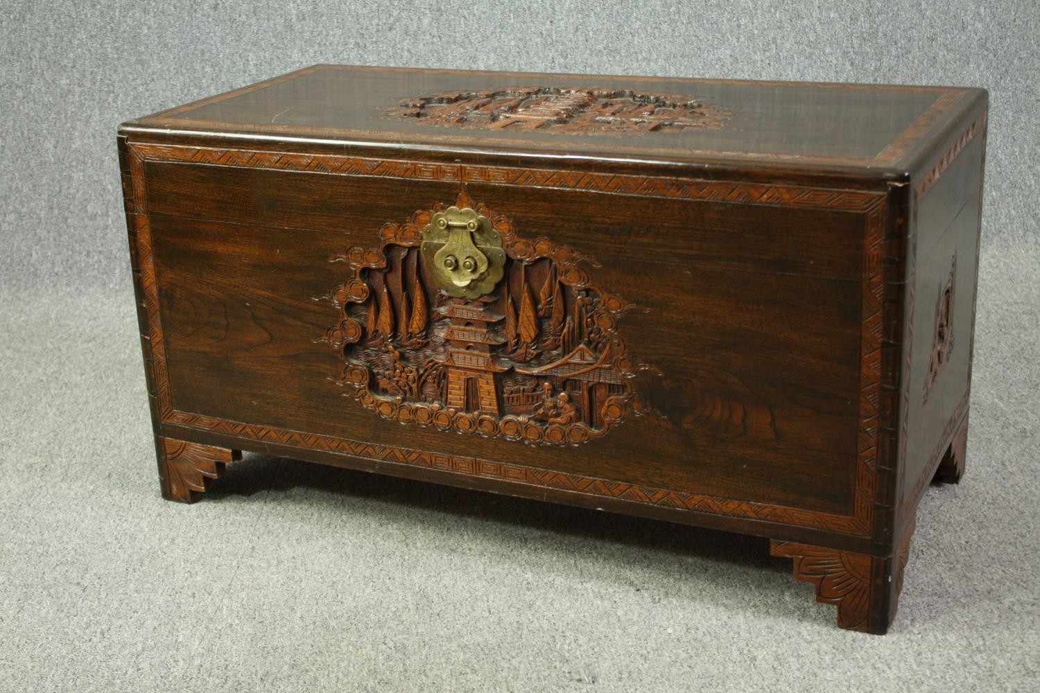 A 1920's Chinese camphorwood chest. H.50 W.93 D.45cm. - Image 4 of 9