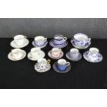 A group of various porcelain cups and saucers. H.6cm. (largest).