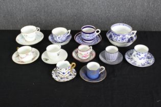 A group of various porcelain cups and saucers. H.6cm. (largest).