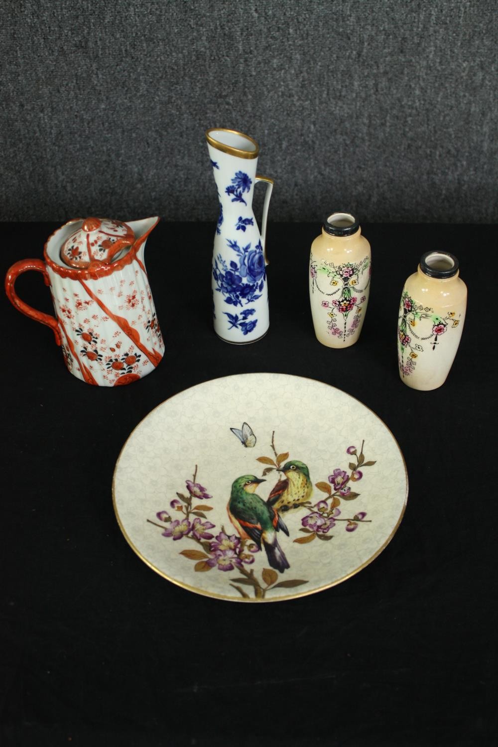 A Bavaria Waldershof blue and white vase, a Worcester plate decorated with birds, and other