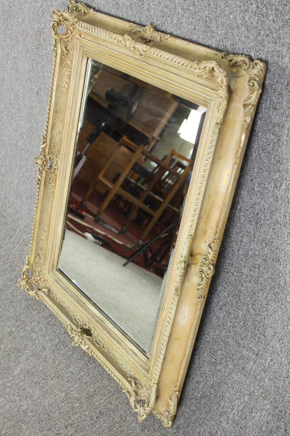 A cream painted carved wood and gesso wall mirror. H.96 W.77cm. - Image 3 of 5