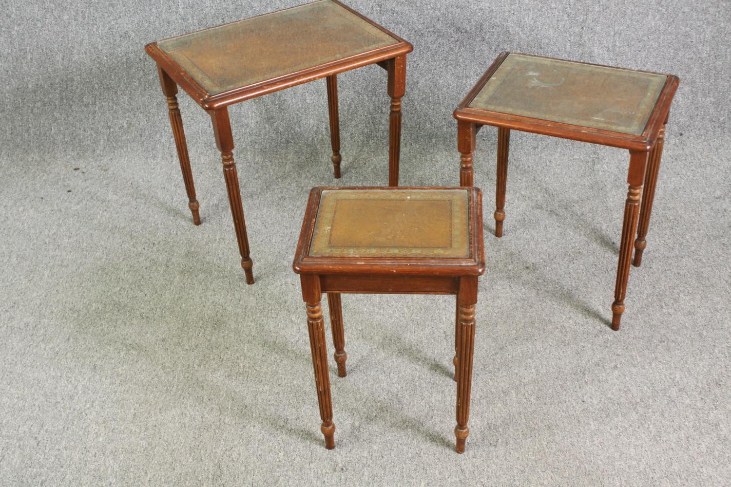 A nest of three mahogany tables with leather and glass inset tops H.58 W.53 D.40cm. (largest). - Image 4 of 6