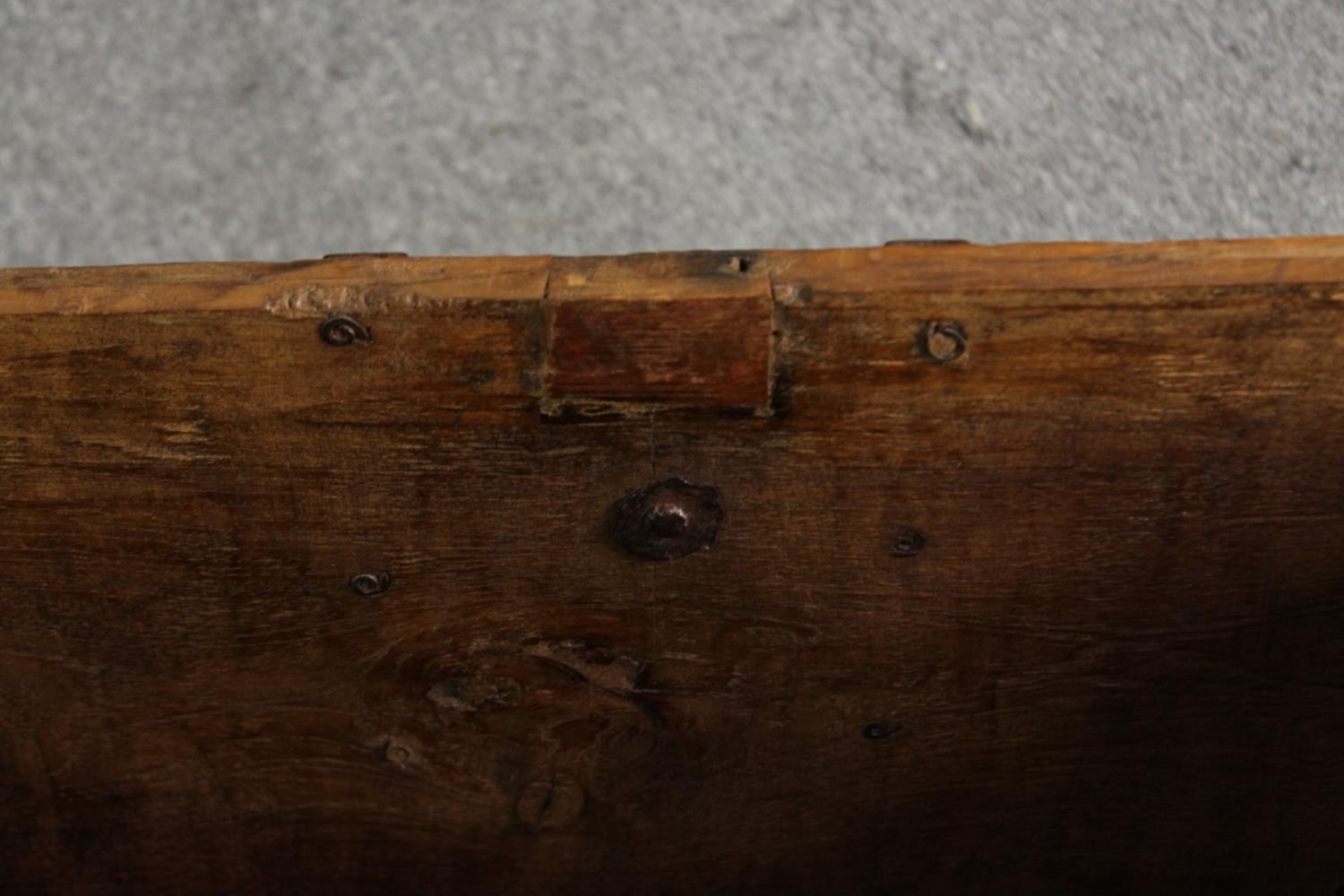 A continental pitch pine and metal bound lidded chest, probably 19th century, H.70 W.110 D.60cm. - Image 11 of 12