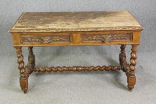 A Victorian carved oak side table, circa 1870, in the 17th century manner, with two frieze