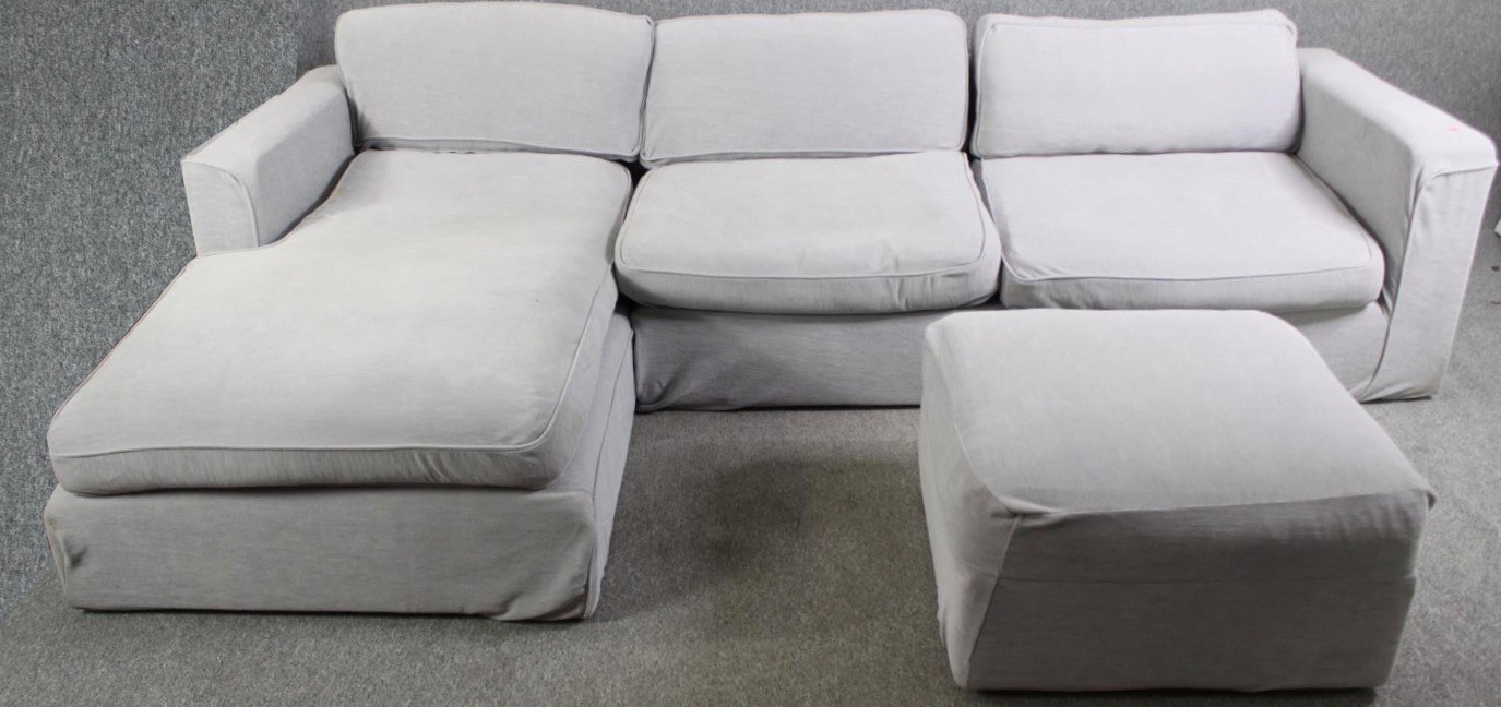 A contemporary Plumbs light grey corner sofa and matching stool. H.78 W.290 D.175cm.