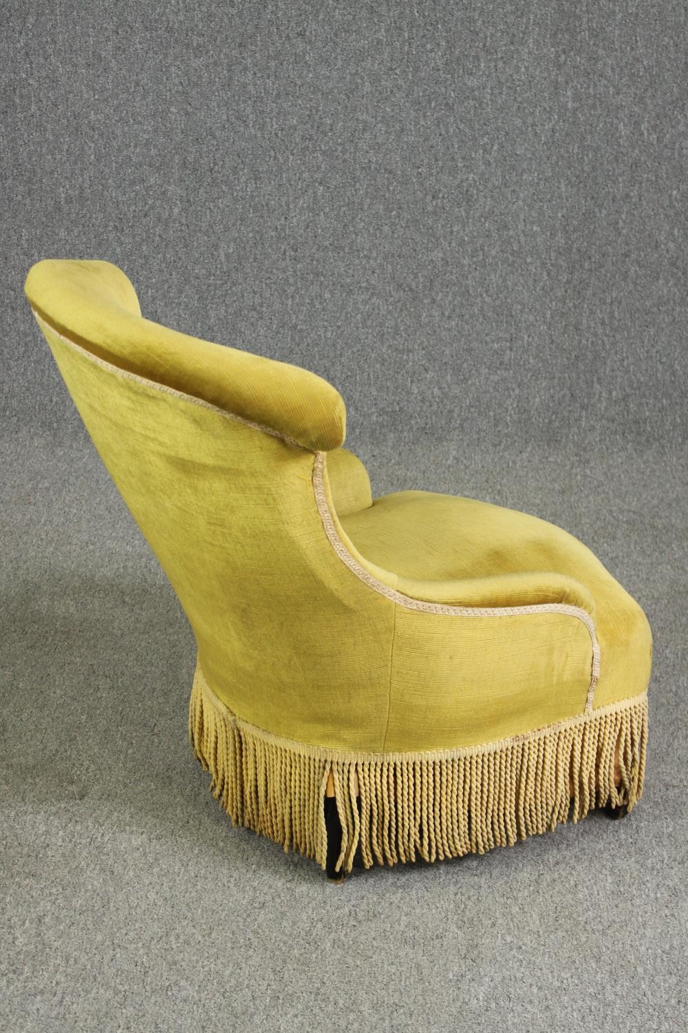 A Victorian wing back upholstered easy chair. - Image 3 of 6