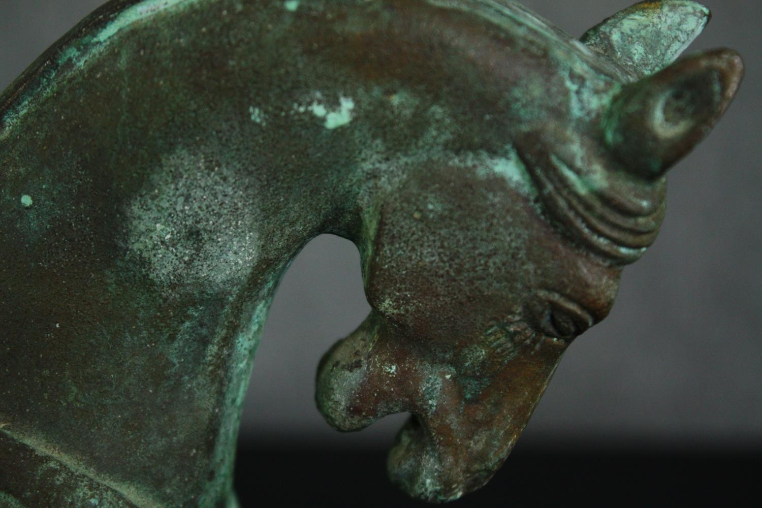 A Chinese Tang style bronzed metal model of a horse, with verdigris patination. H.22cm. - Image 4 of 6