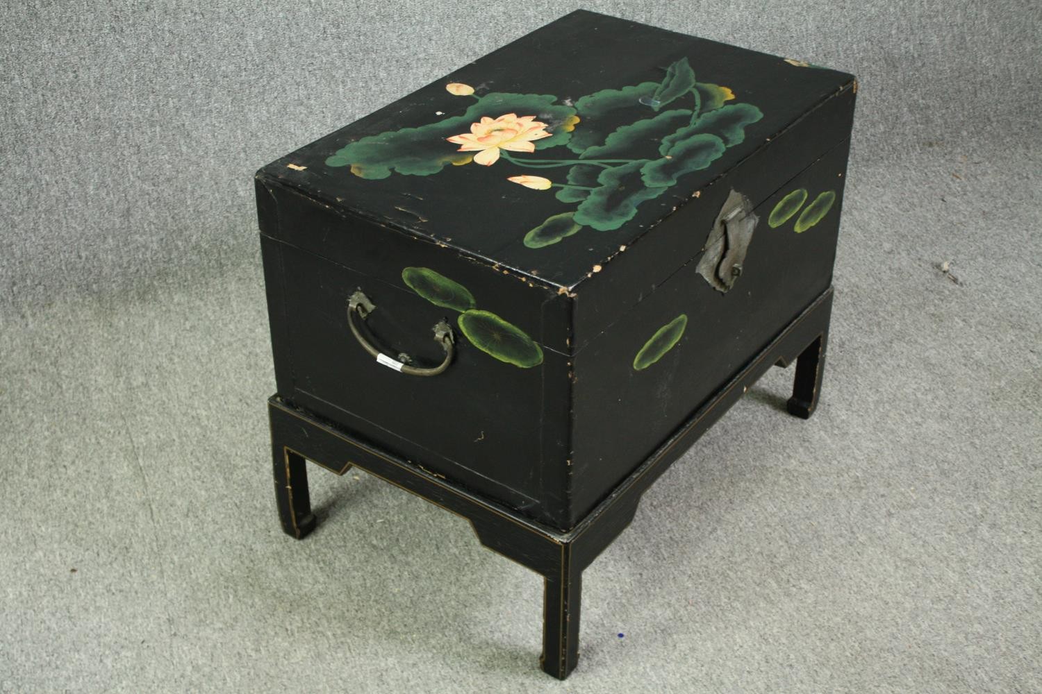 A Chinese black lacquered travelling chest on stand, hand decorated with peonies, early 20th - Image 2 of 6