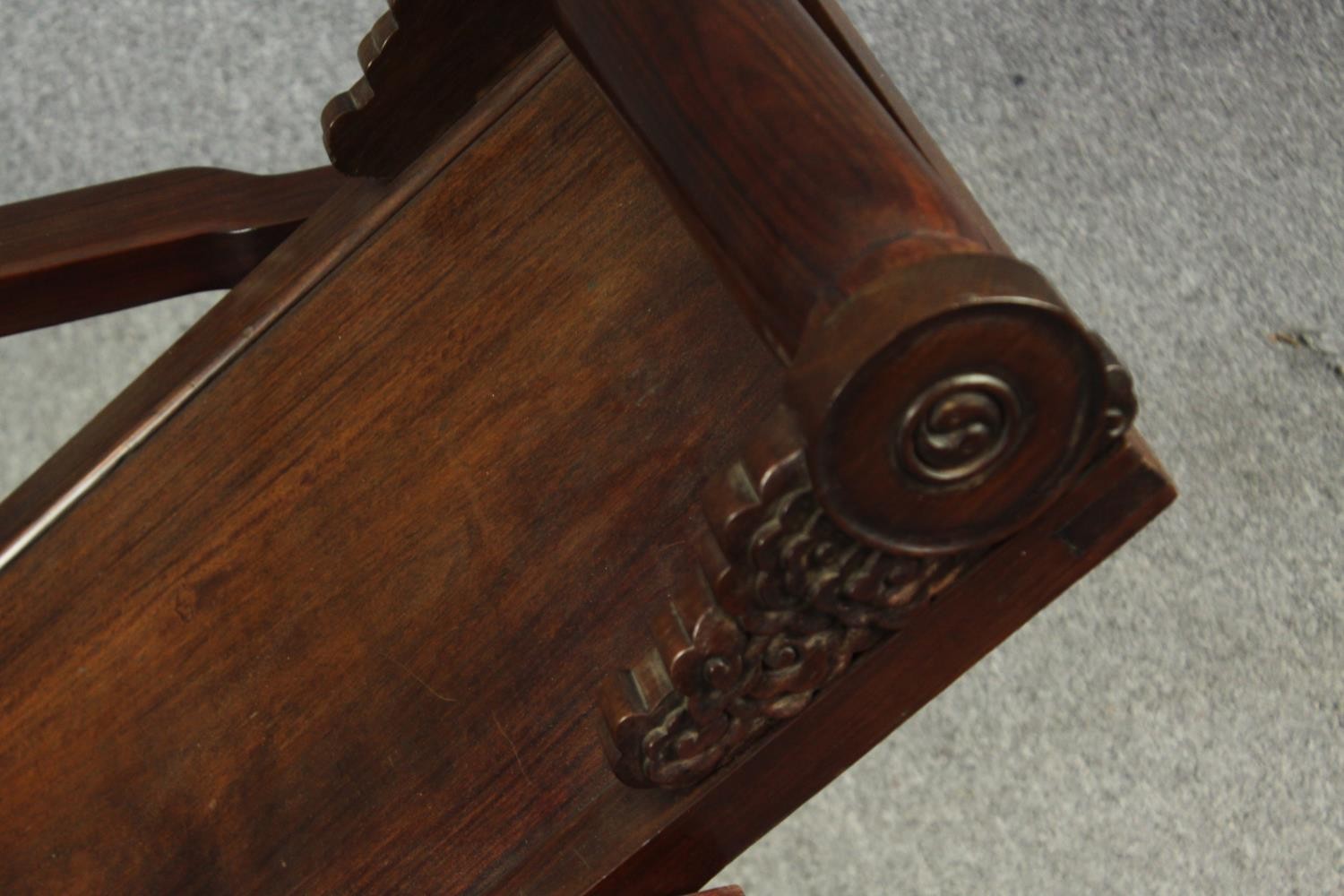 A Chinese carved hardwood folding chair, 19th century. H.78 W.112 D.59cm. - Image 10 of 12