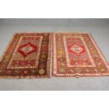 A pair of North West Persian style rugs. L.168 W.100cm. (each).