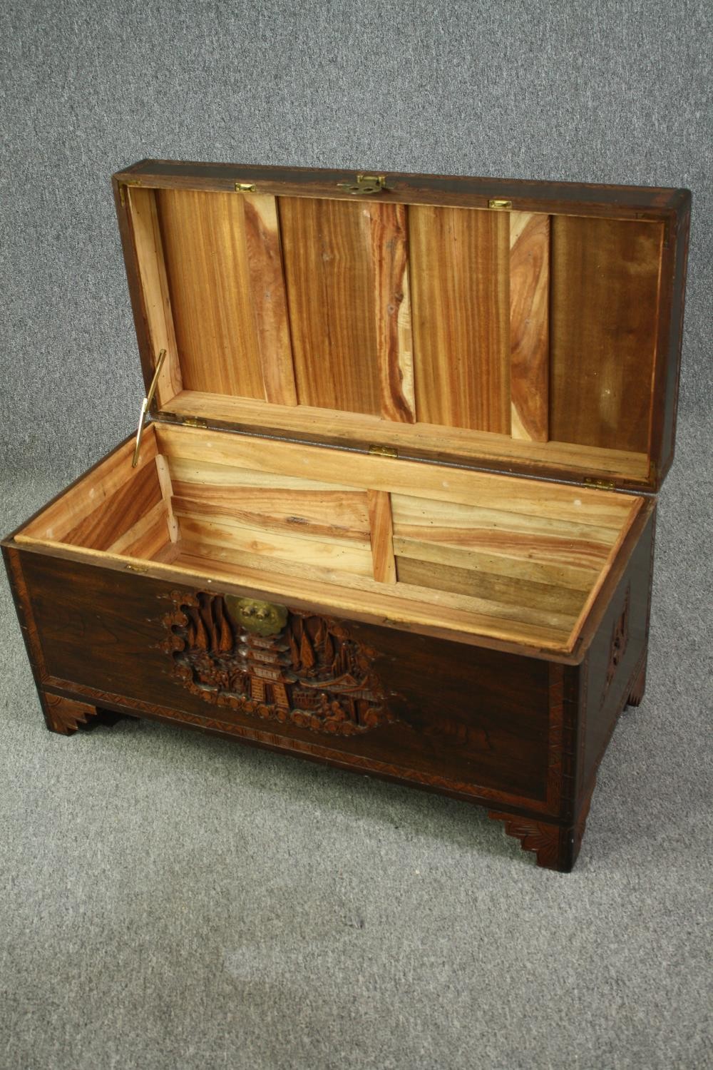 A 1920's Chinese camphorwood chest. H.50 W.93 D.45cm. - Image 7 of 9